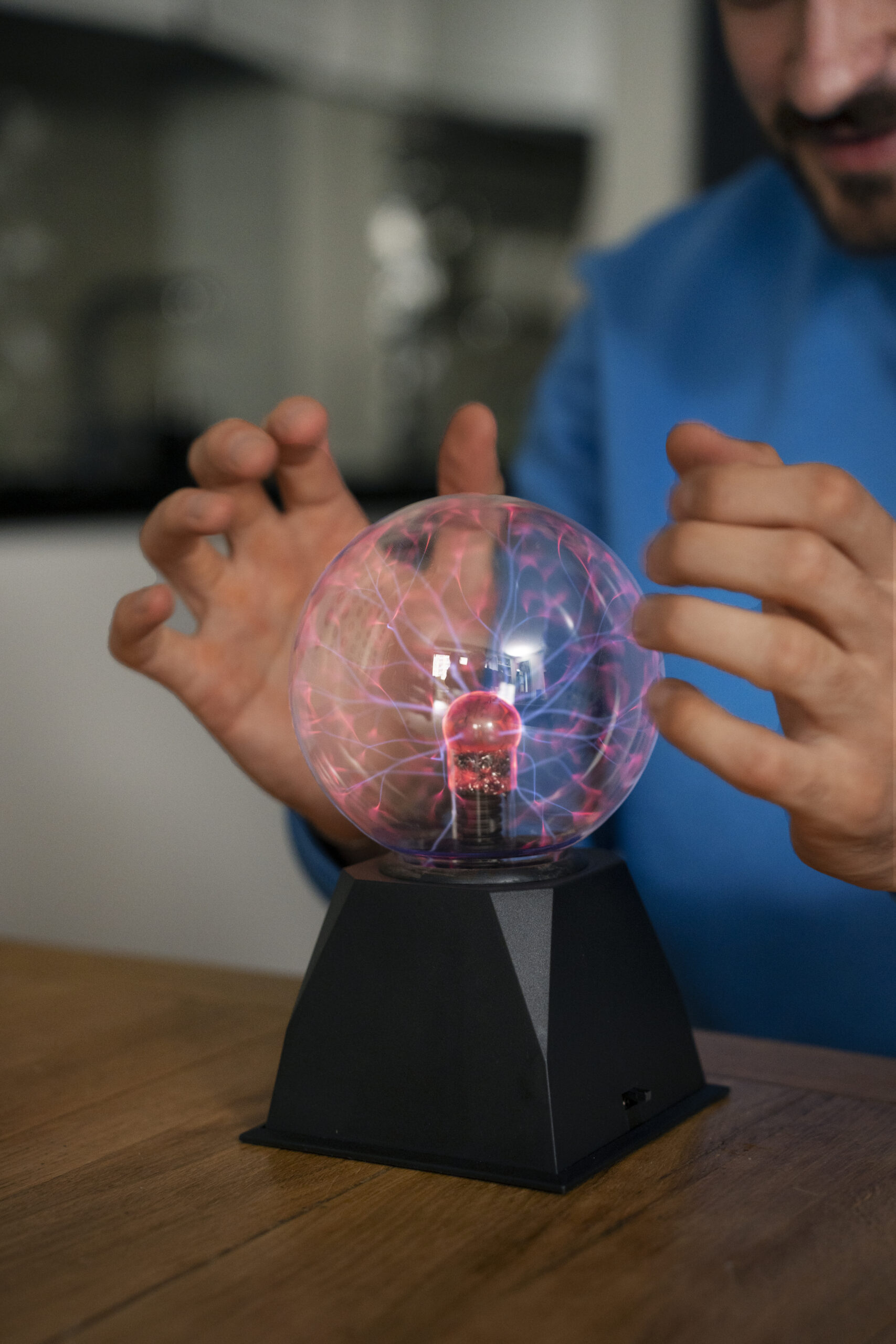 side-view-man-with-plasma-ball